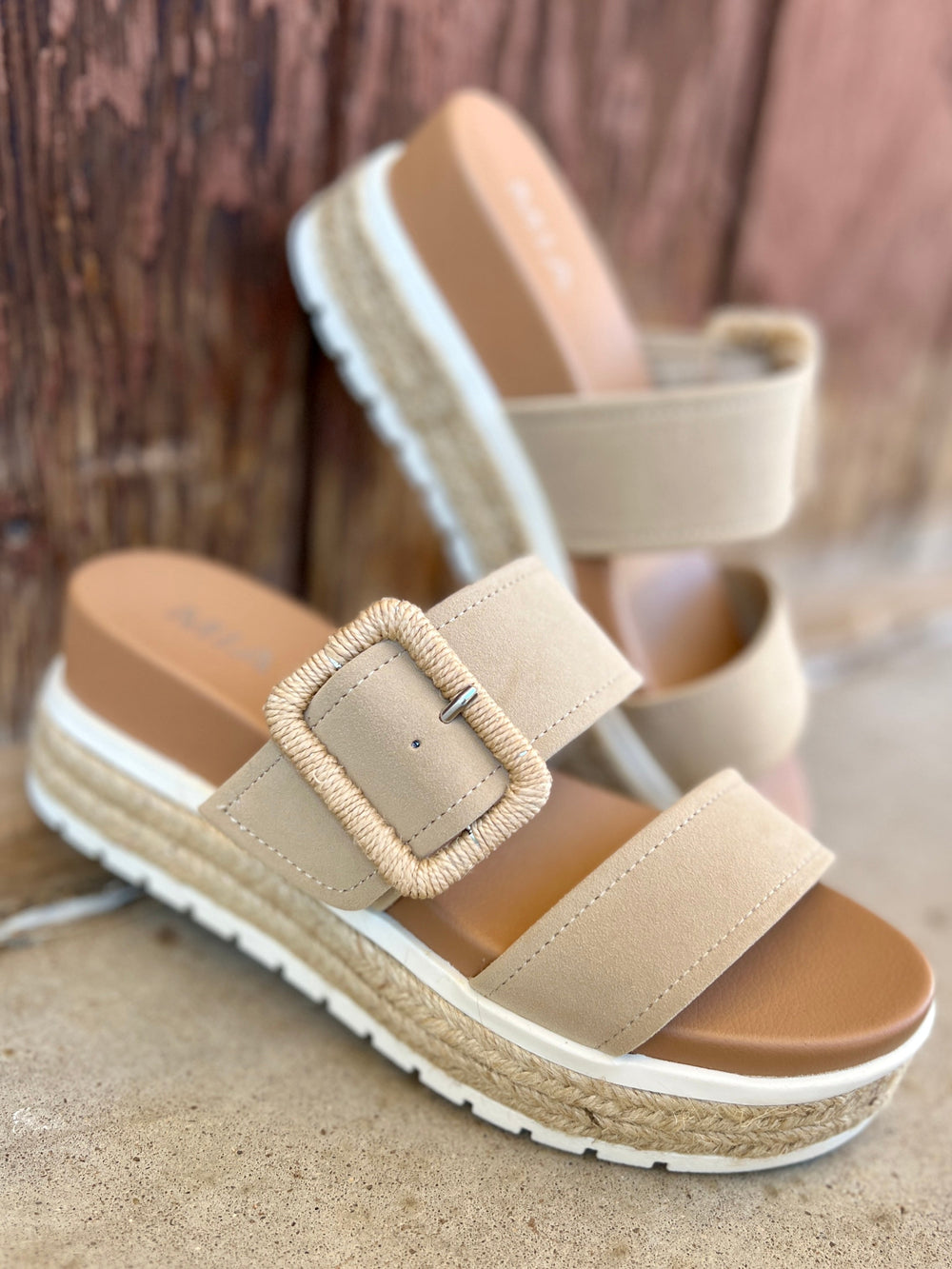 Suede Sand Raffia Platform Sandals | Gussied Up Online Suede sandal. Platform sandal. Neutral color sandal. Fashion trends. Women's shoes. Women's sandals. Women's style. Casual sandal. Women's casual footwear. Spring shoes. Summer shoes. Raffia sandals. Comfortable women's platform sandals. Style. Shoes. Fashion.