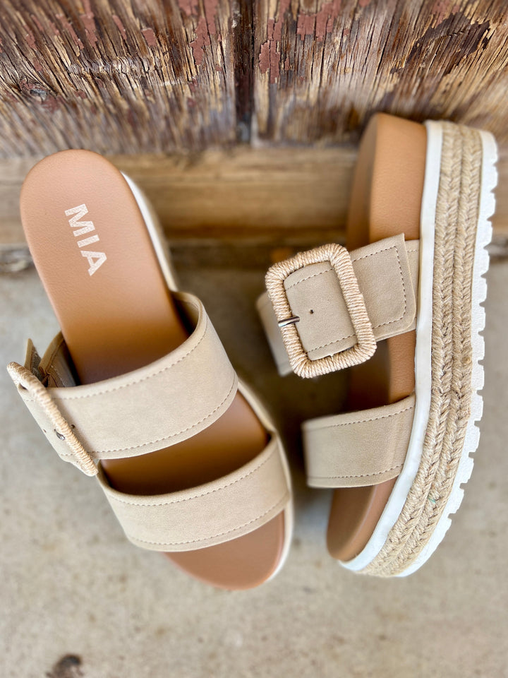 Suede Sand Raffia Platform Sandals | Gussied Up Online Suede sandal. Platform sandal. Neutral color sandal. Fashion trends. Women's shoes. Women's sandals. Women's style. Casual sandal. Women's casual footwear. Spring shoes. Summer shoes. Raffia sandals. Comfortable women's platform sandals. Style. Shoes. Fashion.