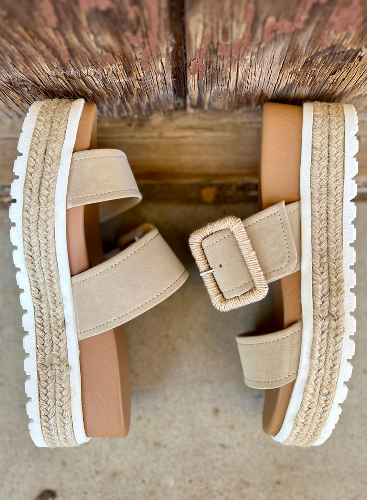 Suede Sand Raffia Platform Sandals | Gussied Up Online Suede sandal. Platform sandal. Neutral color sandal. Fashion trends. Women's shoes. Women's sandals. Women's style. Casual sandal. Women's casual footwear. Spring shoes. Summer shoes. Raffia sandals. Comfortable women's platform sandals. Style. Shoes. Fashion.