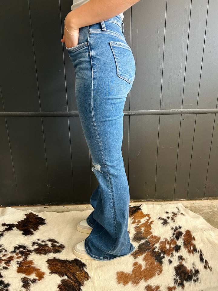 Mid Rise Classic Flare Distressed Jeans*