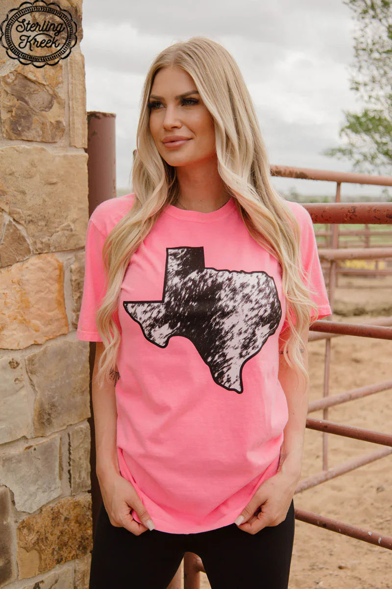 Sterling Kreek Deep in the Herd of Texas Tee I Gussied Up Online. graphic tee. top. women's top. crew neck. short sleeve. neon. neon pink. texas. state of texas design. cow print. small business. Women's Western Boutique. Ships fast from Texas. 