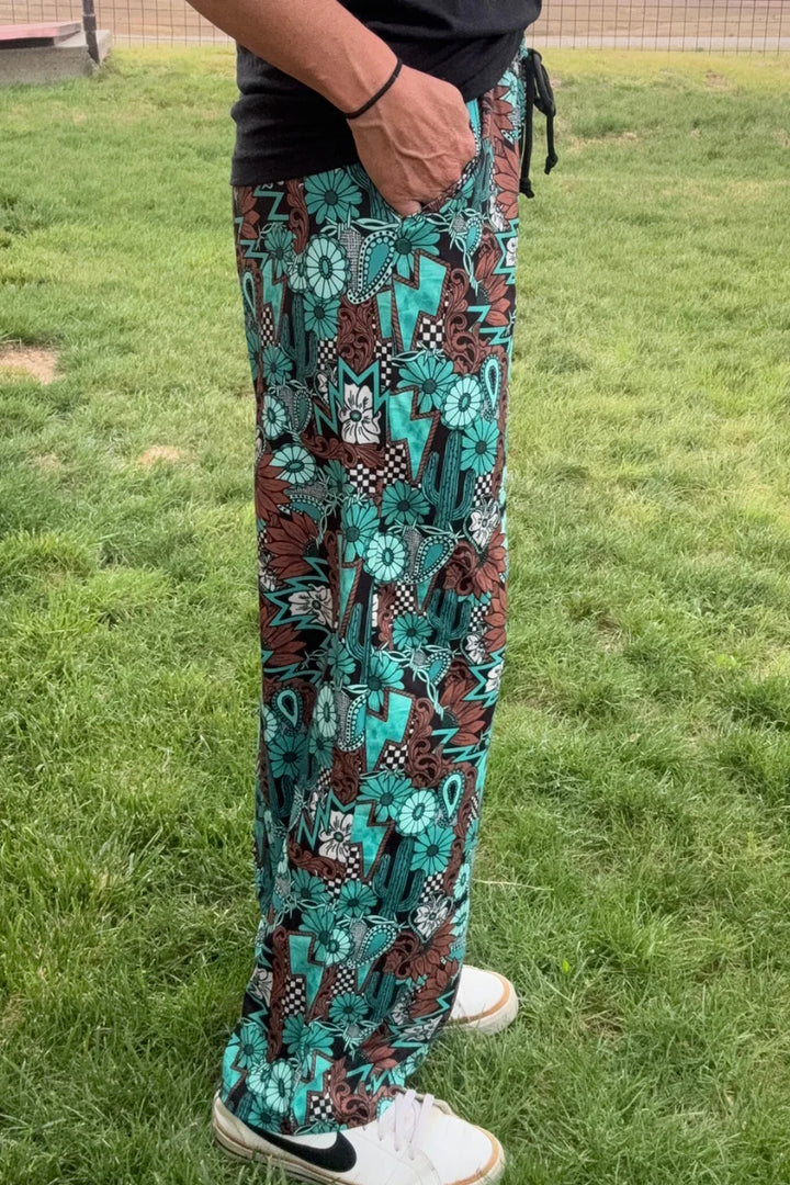Sterling Kreek Tattoos In Turquoise Pants